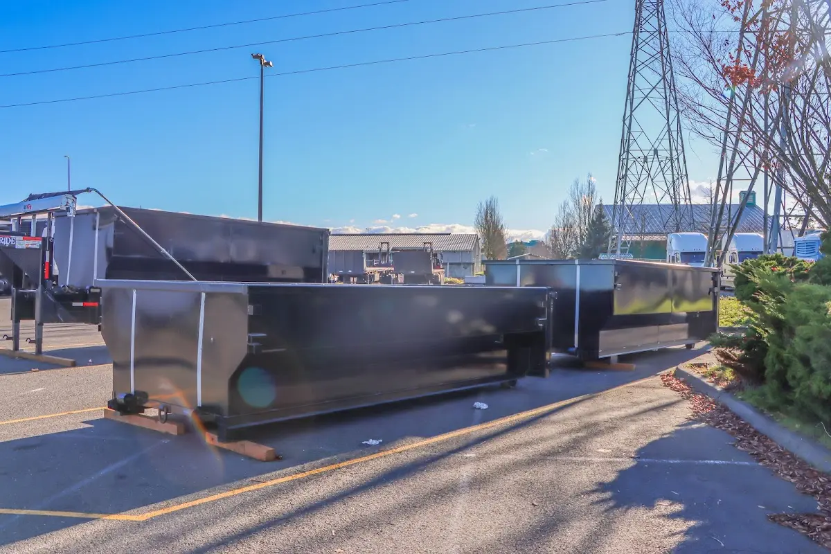 Roll-off dumpster ready for waste disposal at job site for 6 Yard Dumpster Rental in Windsor